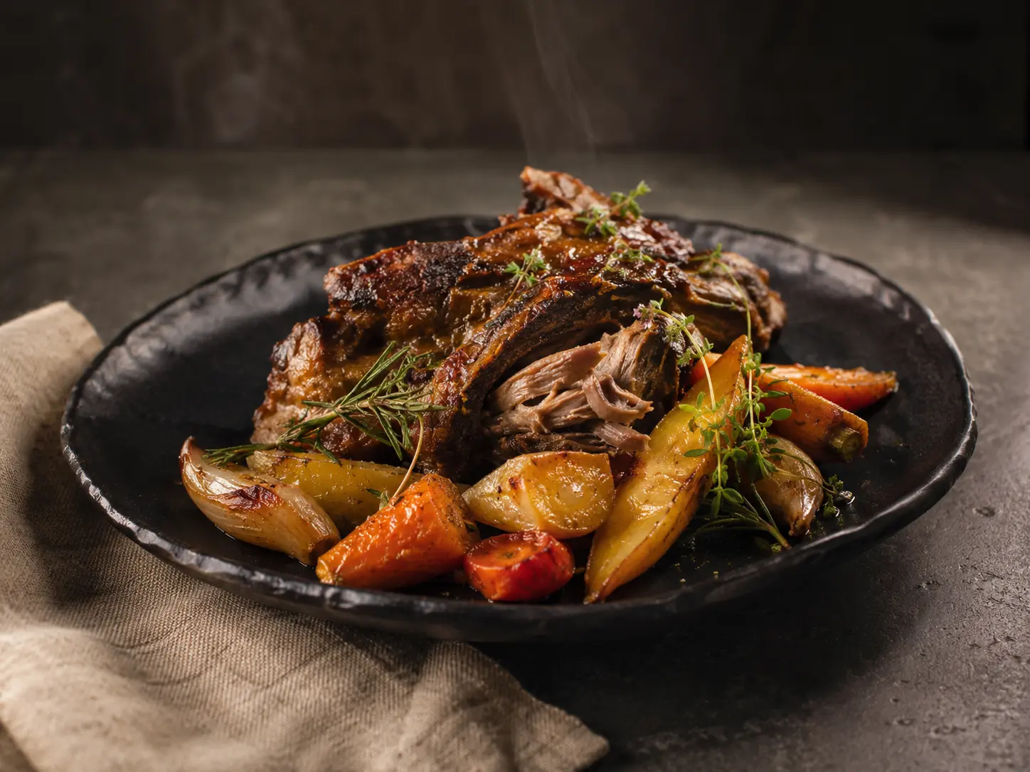Slow-roasted Albanian lamb with seasonal roots on handmade ceramic